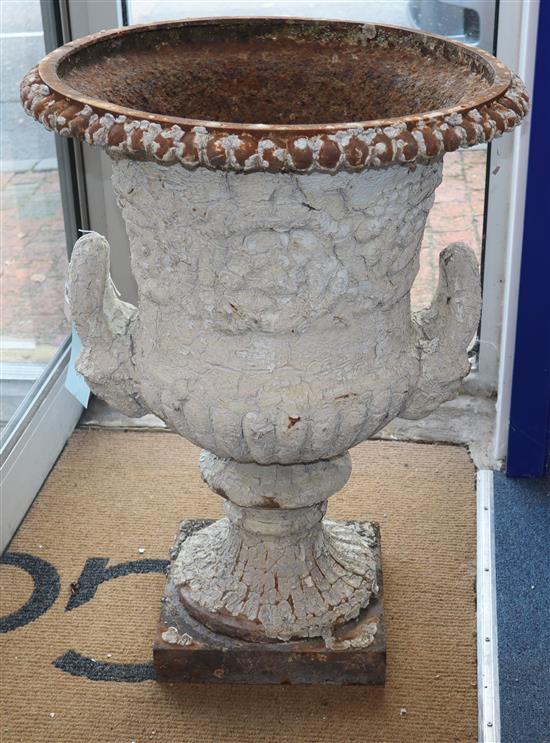 A Victorian white painted cast iron campana-shaped urn W.56cm, H.77cm